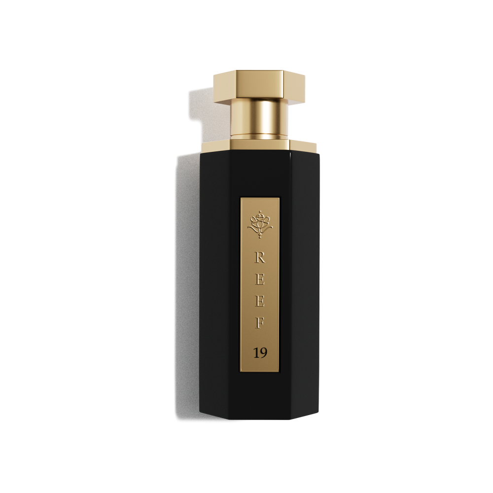 Reef 19 unisex perfume bottle with floral and white musk notes, 100ml elegant fragrance.